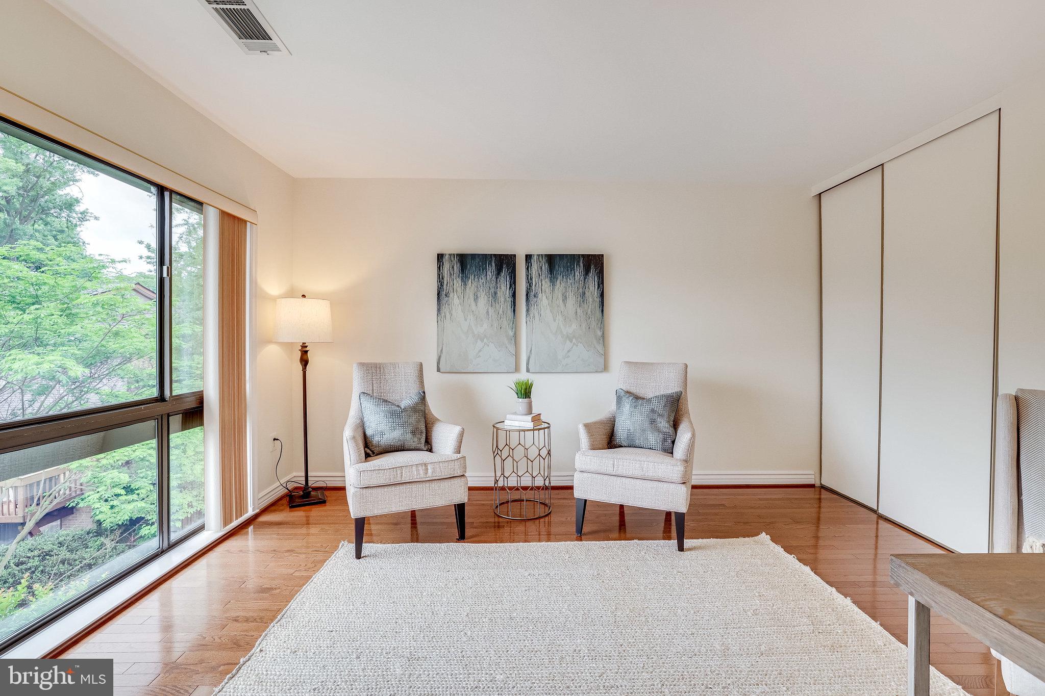 2024 Lakebreeze Way Reston, VA 20191 - Photo 42 of 95 a living room with furniture and a large window