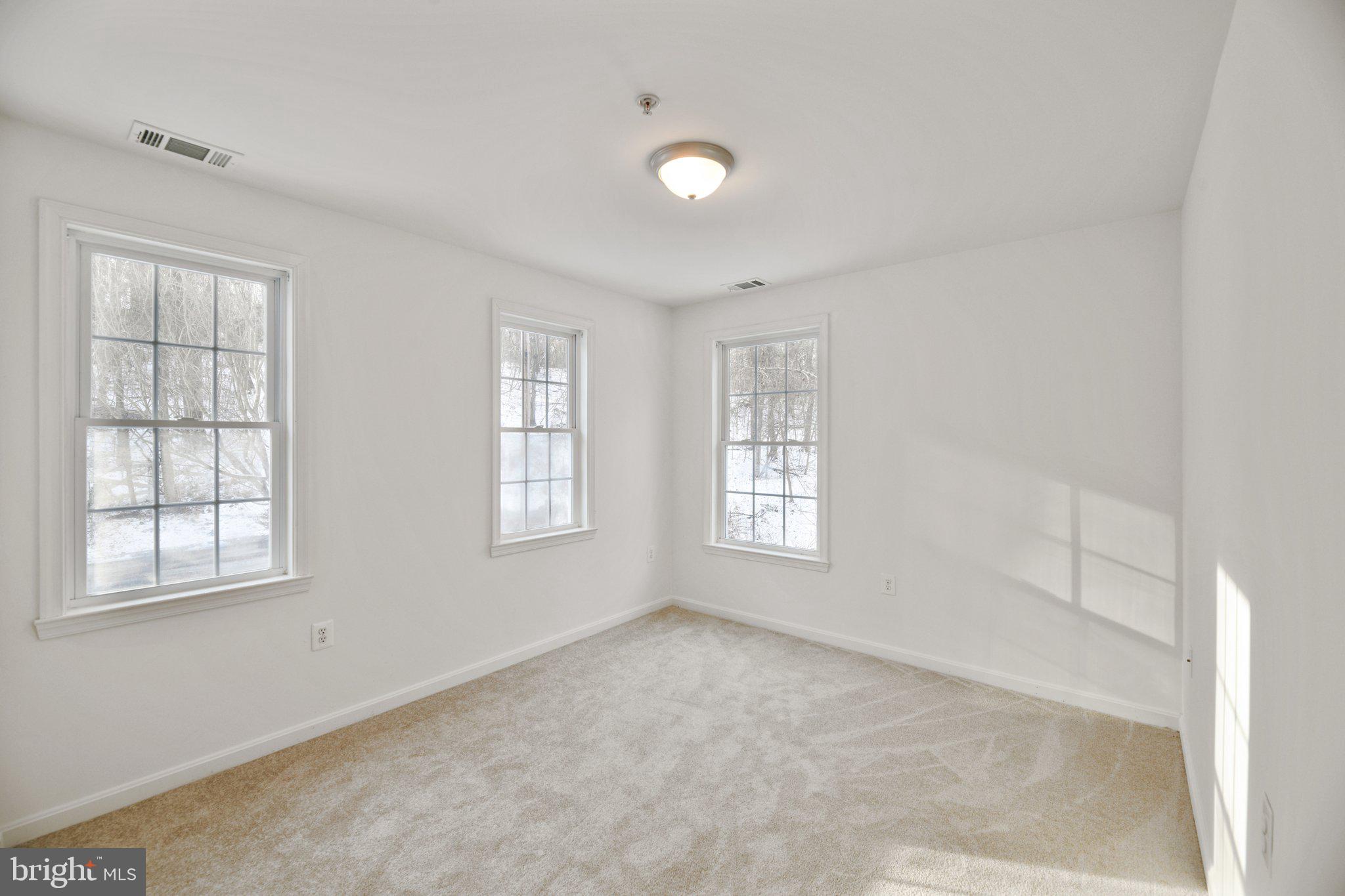 205 Captain Brendt Drive Accokeek, MD 20607 - Photo 20 of 37 a view of an empty room with a window