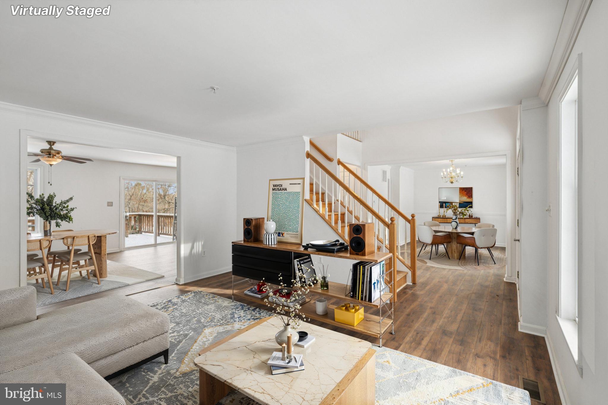 205 Captain Brendt Drive Accokeek, MD 20607 - Photo 2 of 37 a living room with furniture and a wooden floor