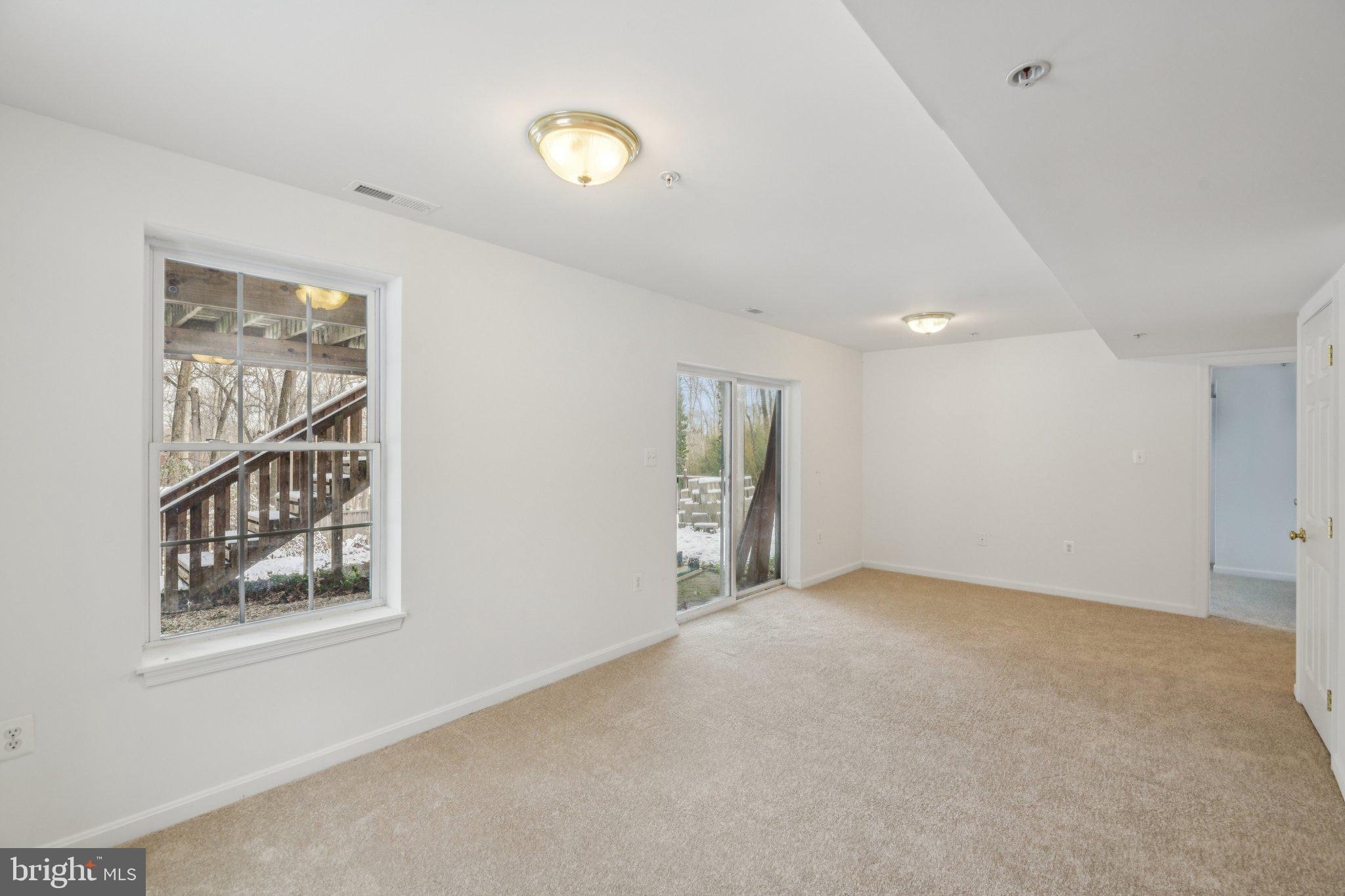 205 Captain Brendt Drive Accokeek, MD 20607 - Photo 27 of 37 a view of an empty room with a window