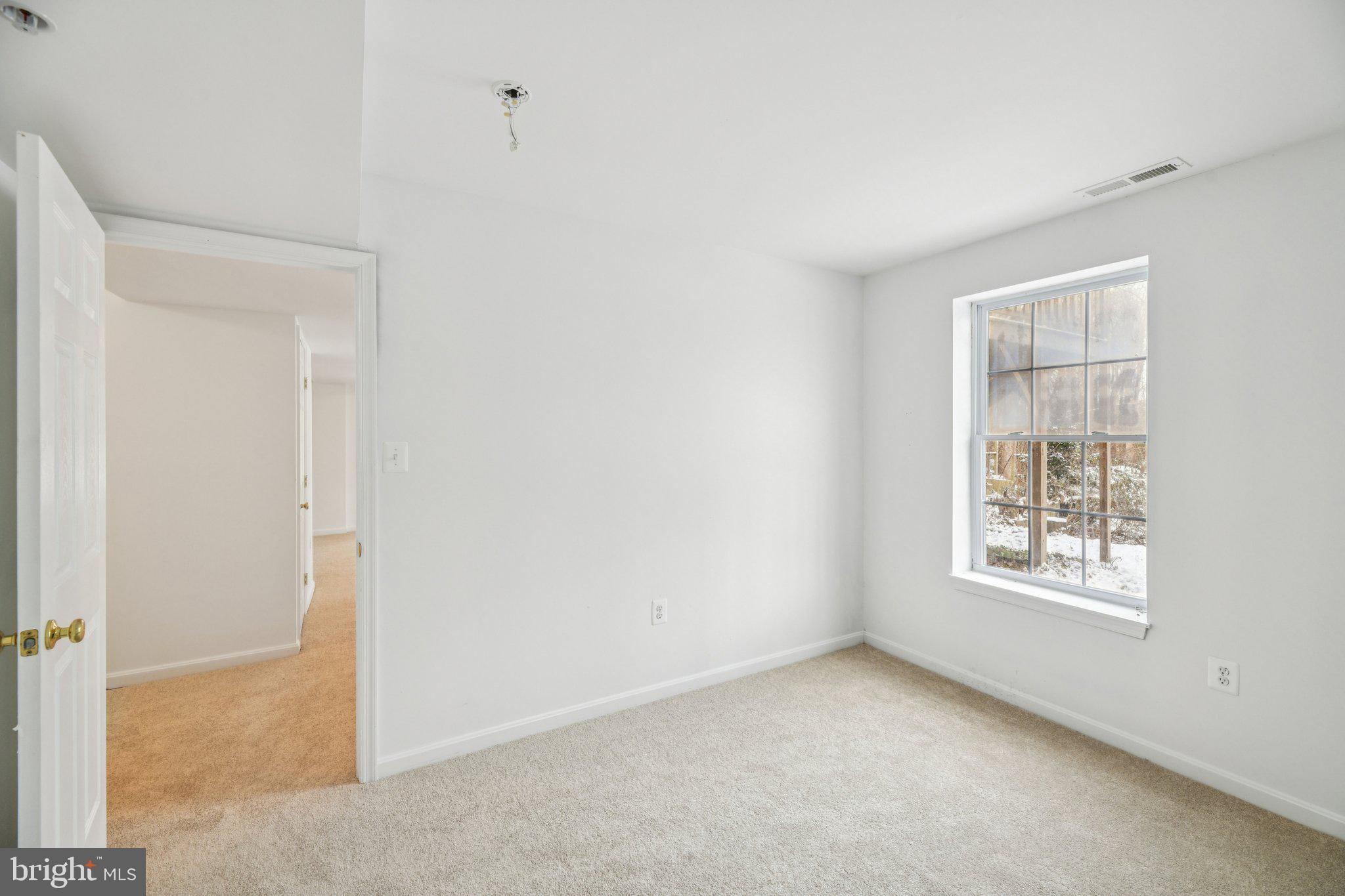 205 Captain Brendt Drive Accokeek, MD 20607 - Photo 28 of 37 an empty room with windows and closet