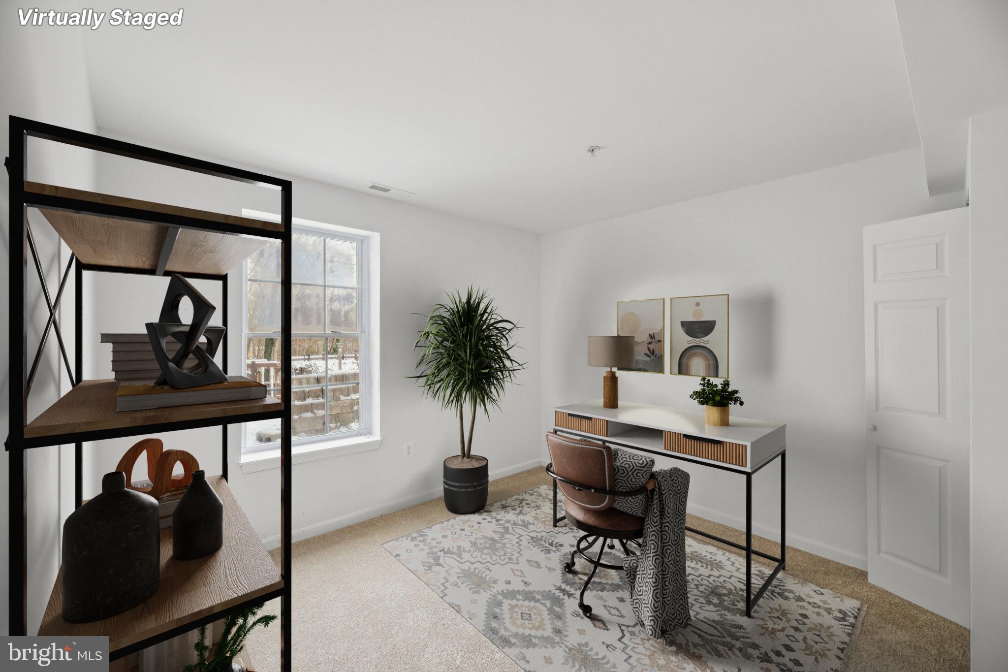 205 Captain Brendt Drive Accokeek, MD 20607 - Photo 29 of 37 a workspace with furniture window and wooden floor