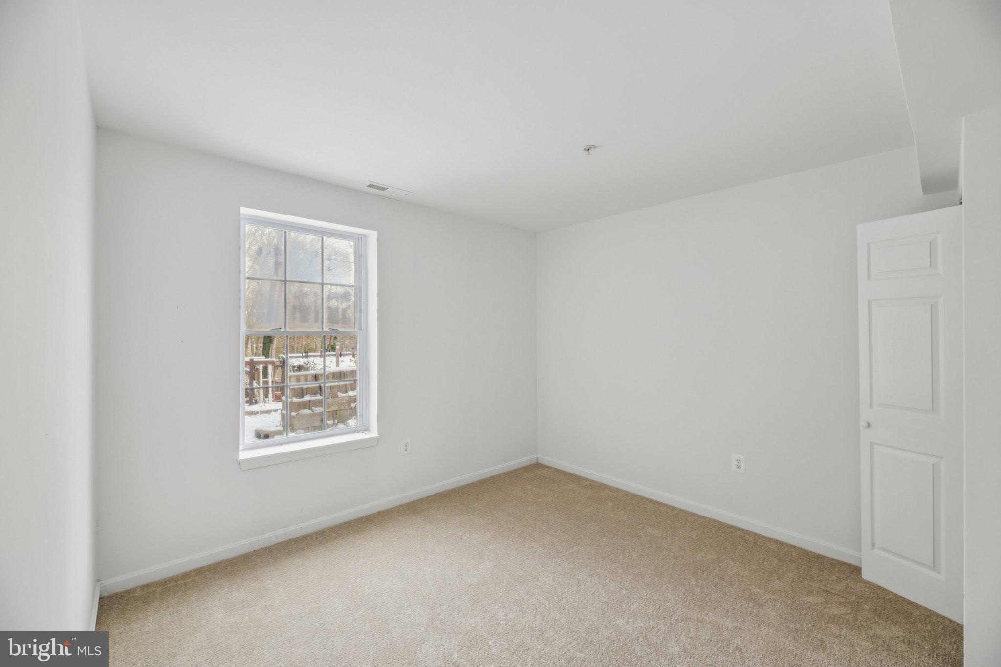 205 Captain Brendt Drive Accokeek, MD 20607 - Photo 30 of 37 an empty room with windows