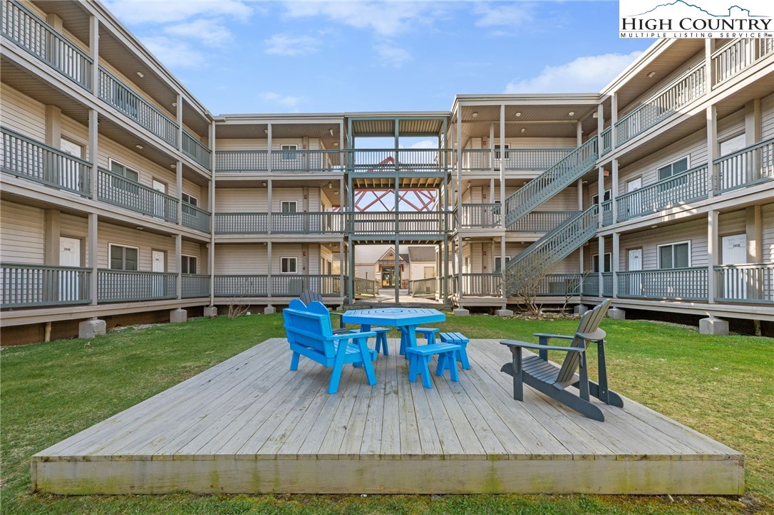 301 Pinnacle Inn Road, Unit 3219 Beech Mountain, NC 28604 - Photo 22 of 30 a building view with a seating space and garden