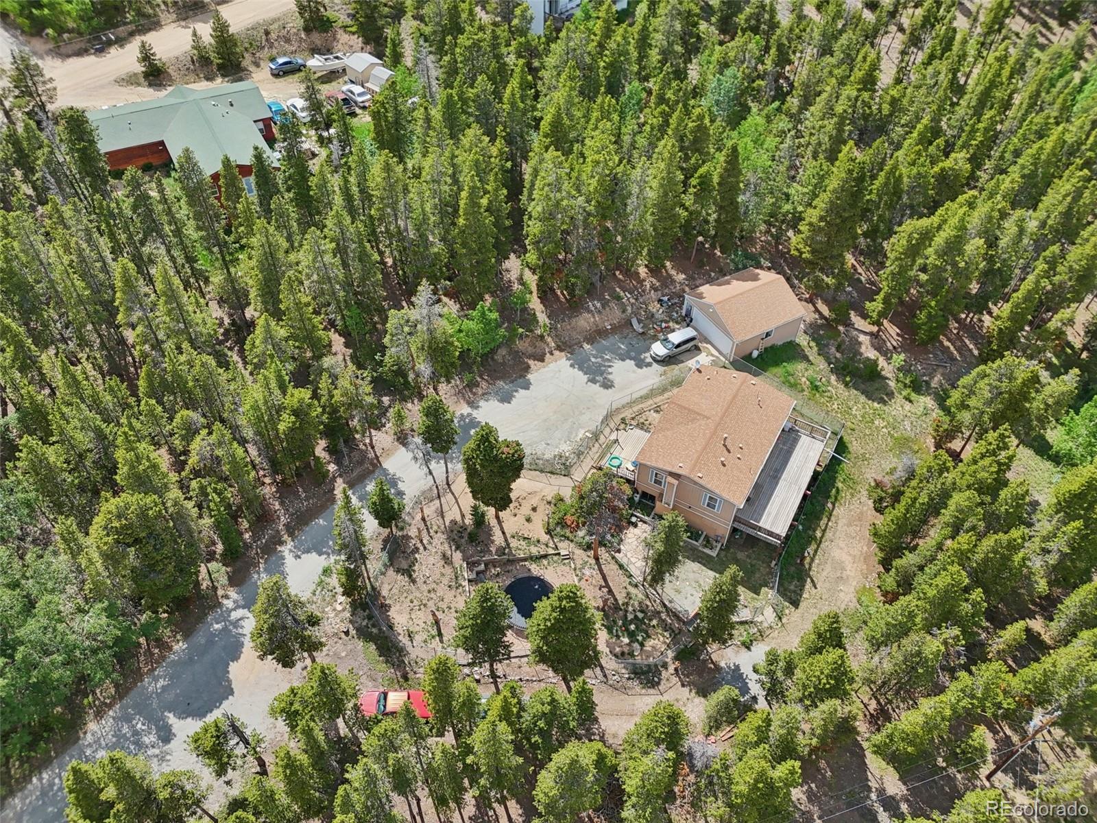 81 Atlantis Road Black Hawk, CO 80422 - Photo 35 of 40 an aerial view of a house with yard and outdoor space