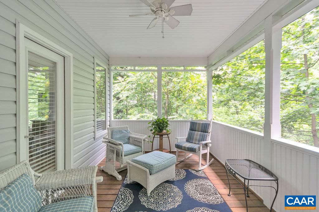 741 Dry Bridge Road Charlottesville, VA 22903 - Photo 33 of 37 a living room with furniture and a window
