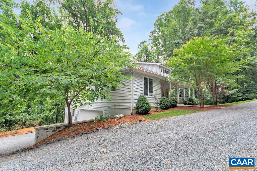 741 Dry Bridge Road Charlottesville, VA 22903 - Photo 4 of 37 a view of a house with a yard and large tree
