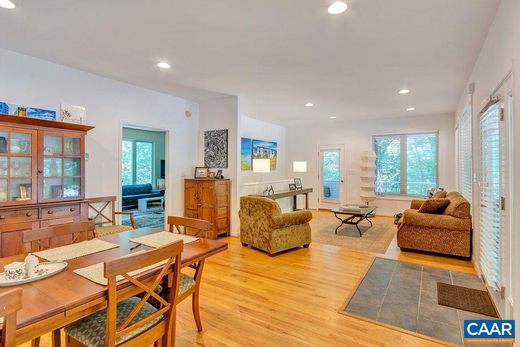 741 Dry Bridge Road Charlottesville, VA 22903 - Photo 8 of 37 a living room with fireplace furniture and a large window