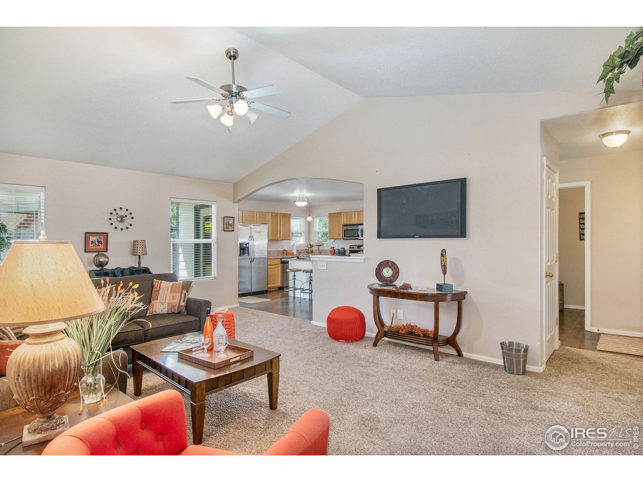 8300 18th St Road Greeley, CO 80634 - Photo 5 of 26 2 Passways to garage - Kit & great room