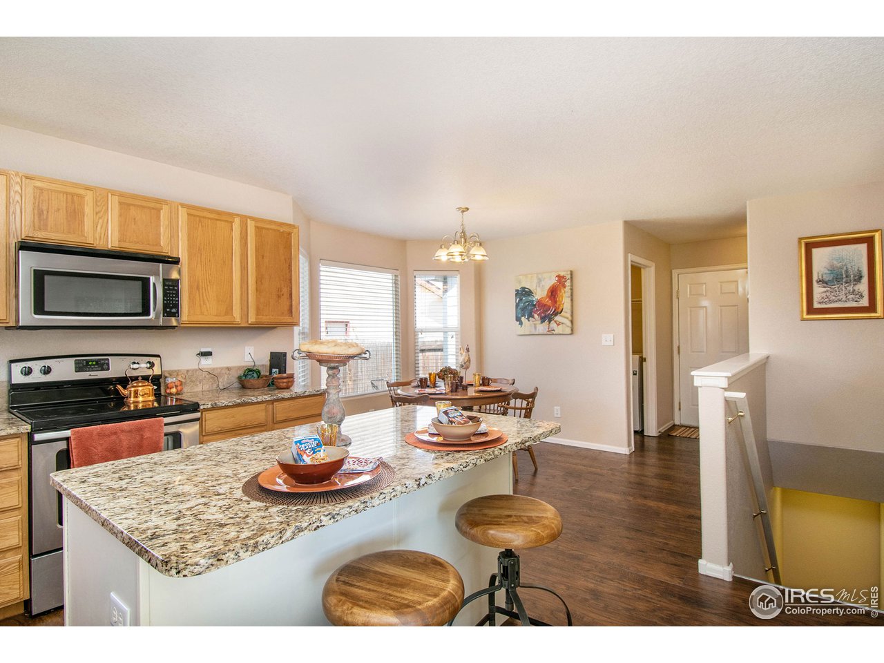 8300 18th St Road Greeley, CO 80634 - Photo 8 of 26 Eat at Island with stairs to basement