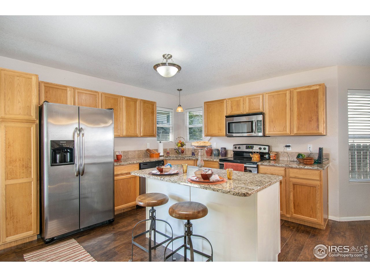 8300 18th St Road Greeley, CO 80634 - Photo 9 of 26 Efficient Kitchen with SS Appliances