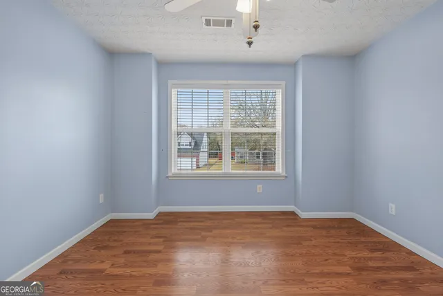 an empty room with a window