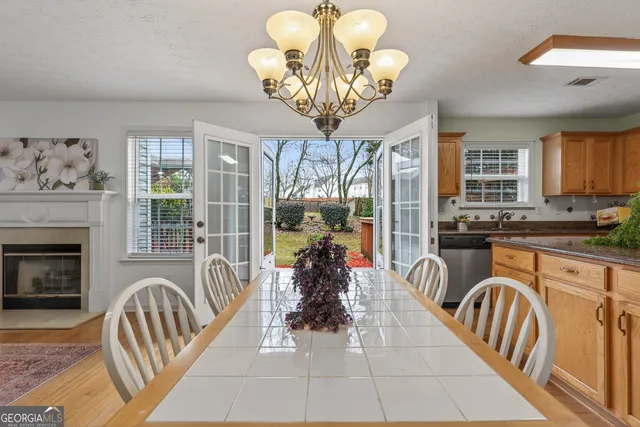 a view of a livingroom with furniture window and wooden floor