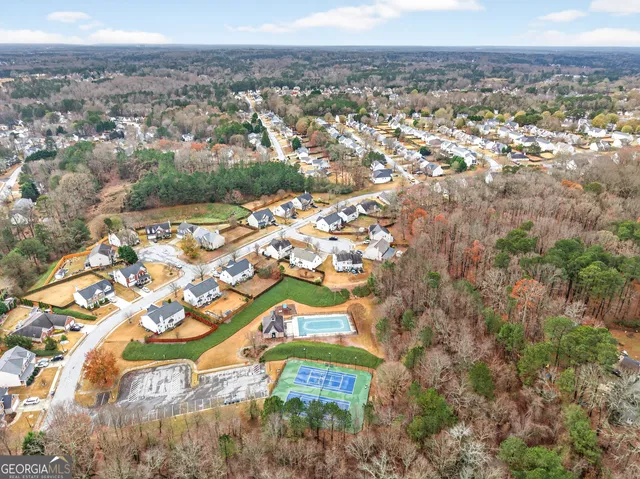 an aerial view of residential building with lake view and ocean view