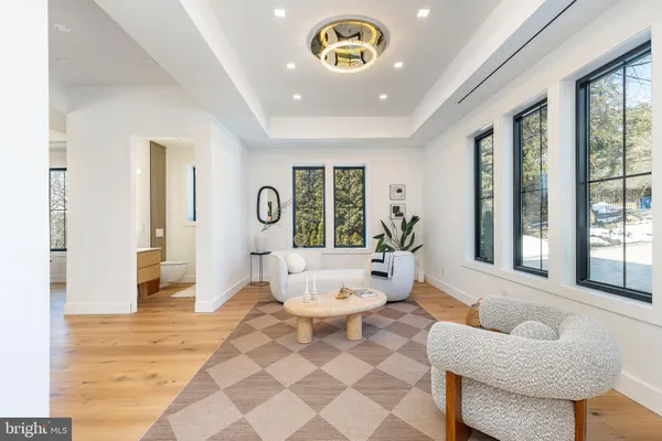 a living room with furniture and a table