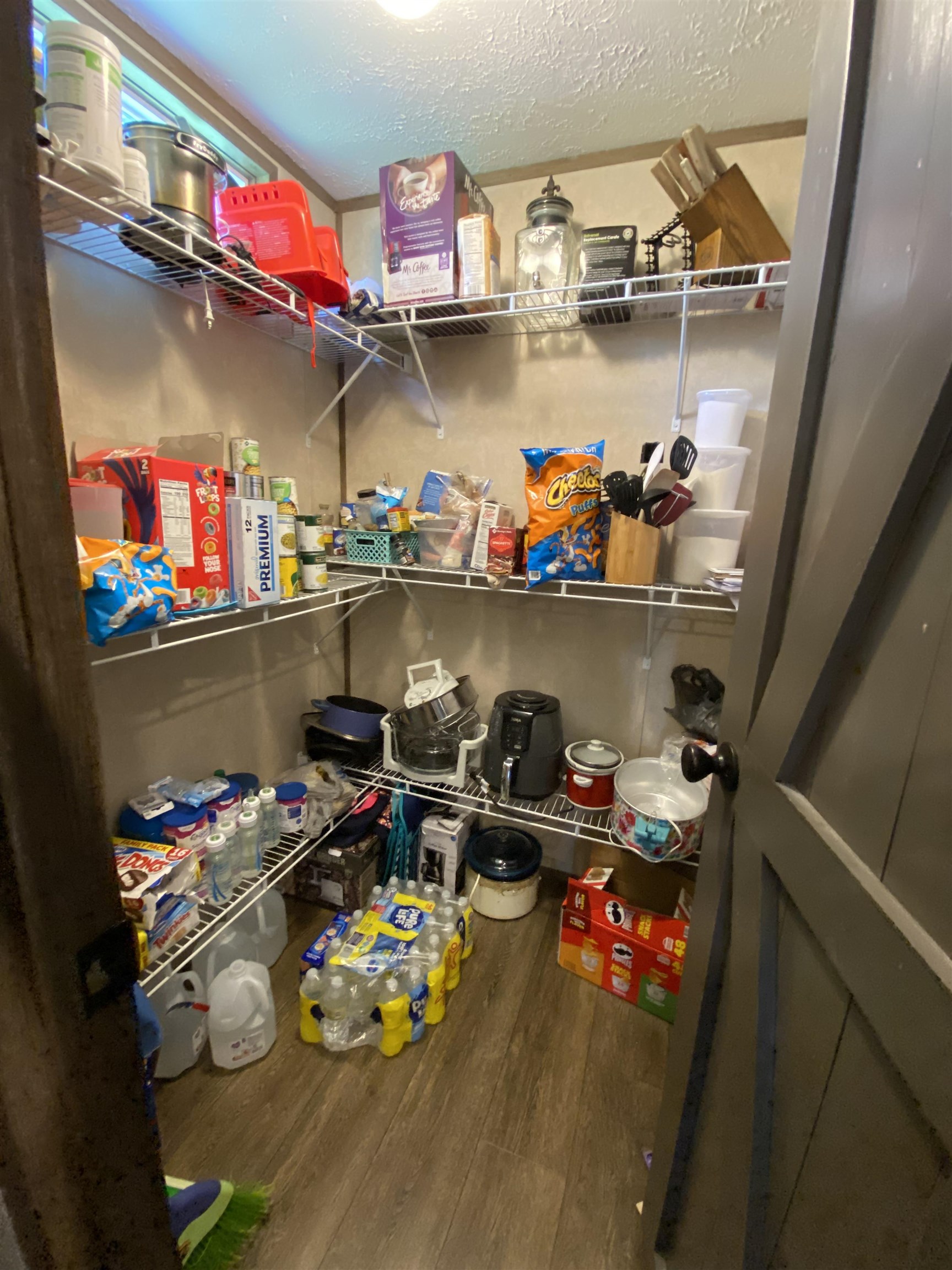 675 Humphrey Road Huntingdon, TN 38344 - Photo 17 of 25 a store room with lots of different colored cloths