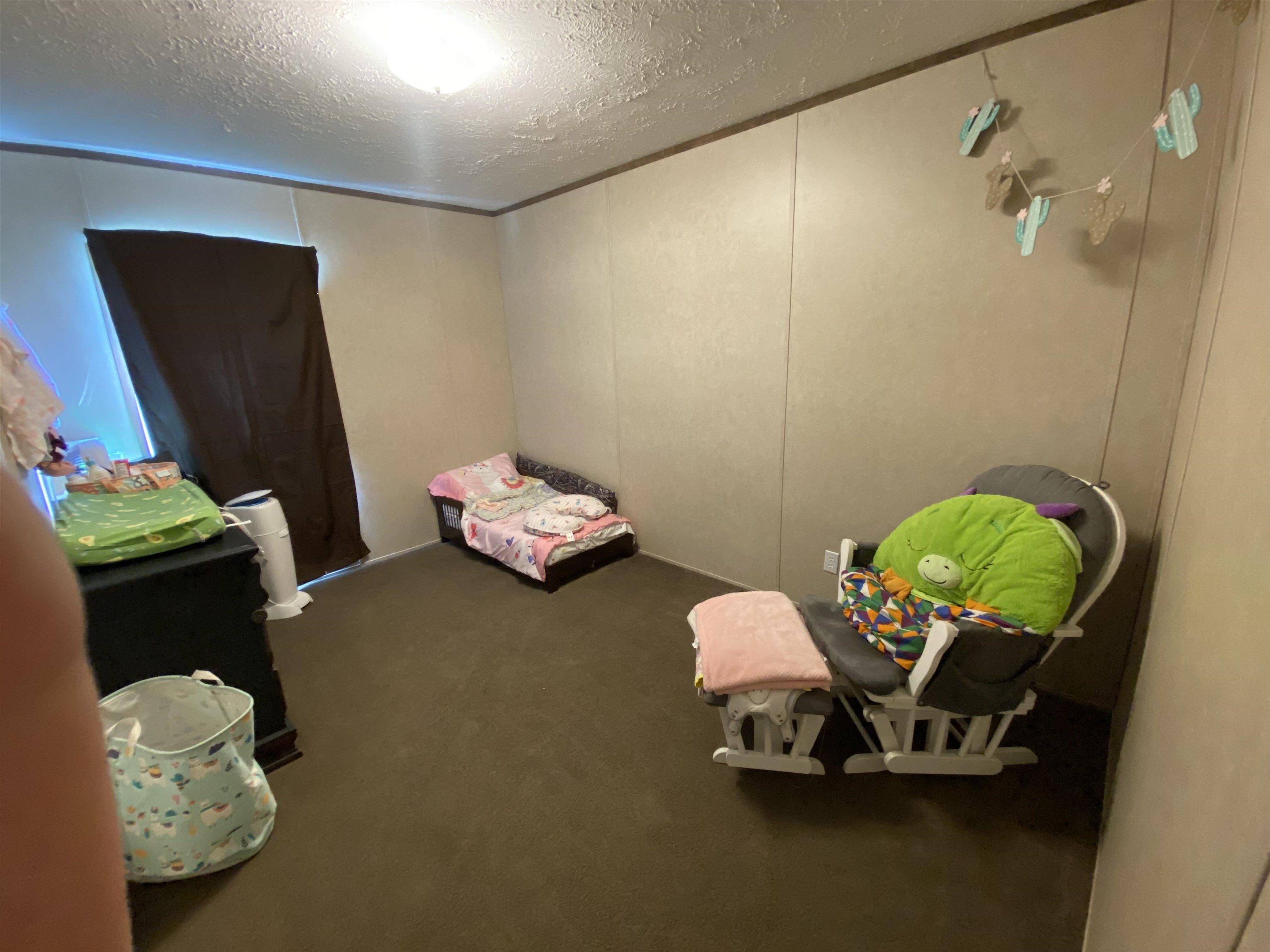 675 Humphrey Road Huntingdon, TN 38344 - Photo 22 of 25 a room with toys and a couch