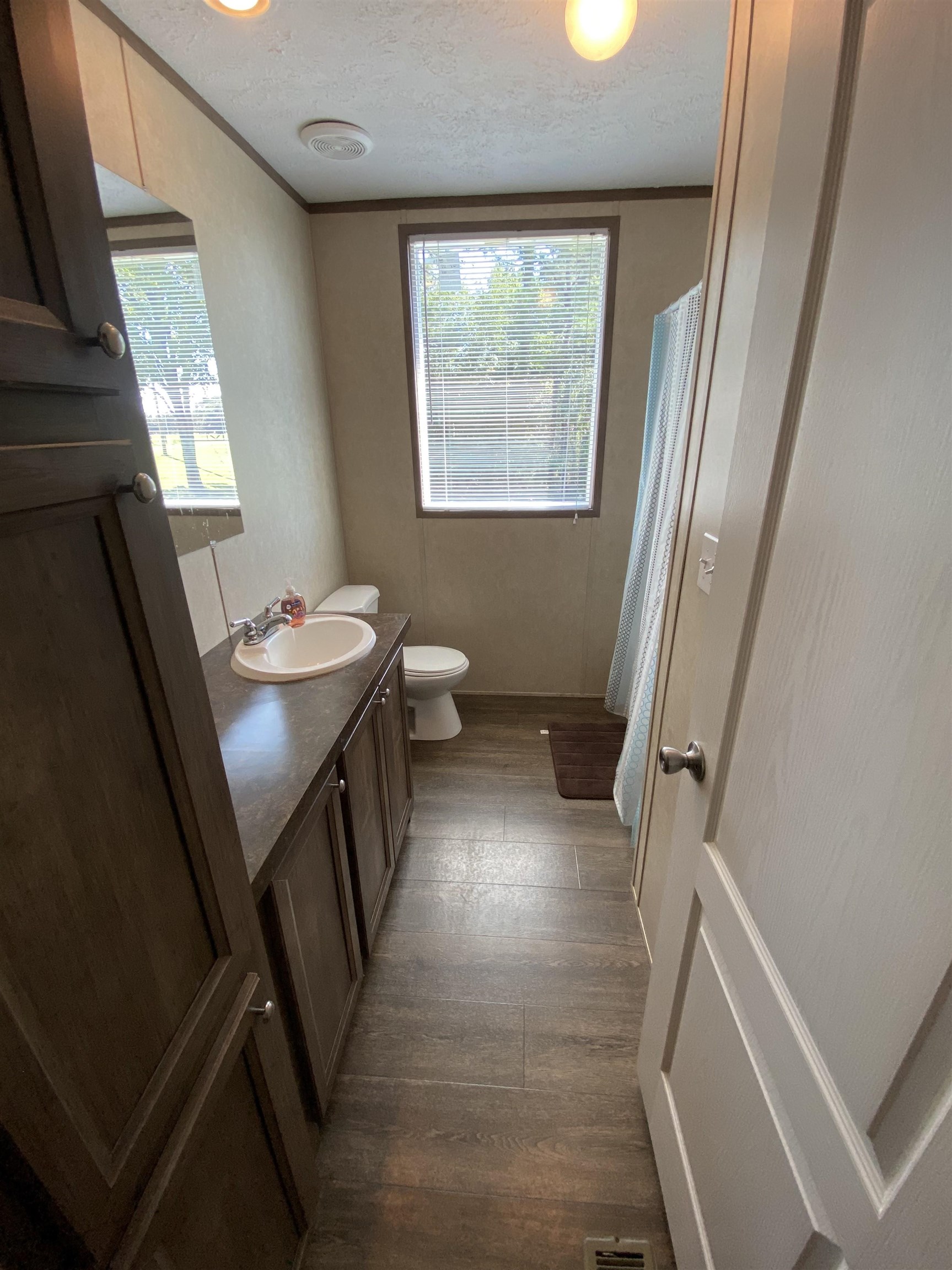 675 Humphrey Road Huntingdon, TN 38344 - Photo 23 of 25 a view of a hallway with furniture and a window