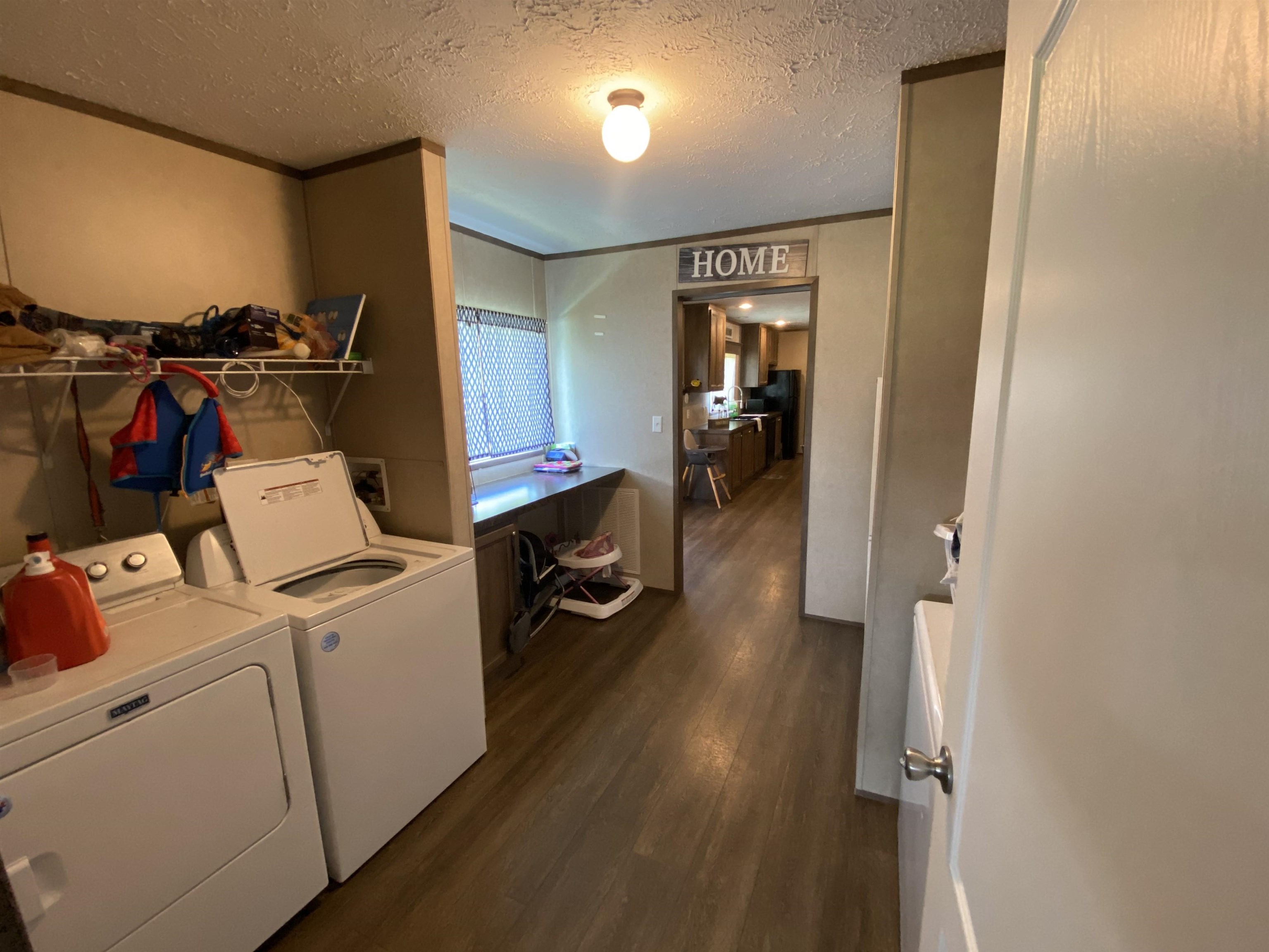 675 Humphrey Road Huntingdon, TN 38344 - Photo 25 of 25 a view of a storage & utility room with washer and dryer