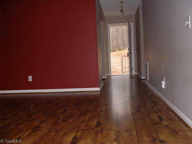 1662 Riverview Road Walnut Cove, NC 27052 - Photo 7 of 7 Other. LR looking down hallway to front door
