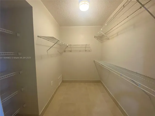 a view of a room with racks on the wall