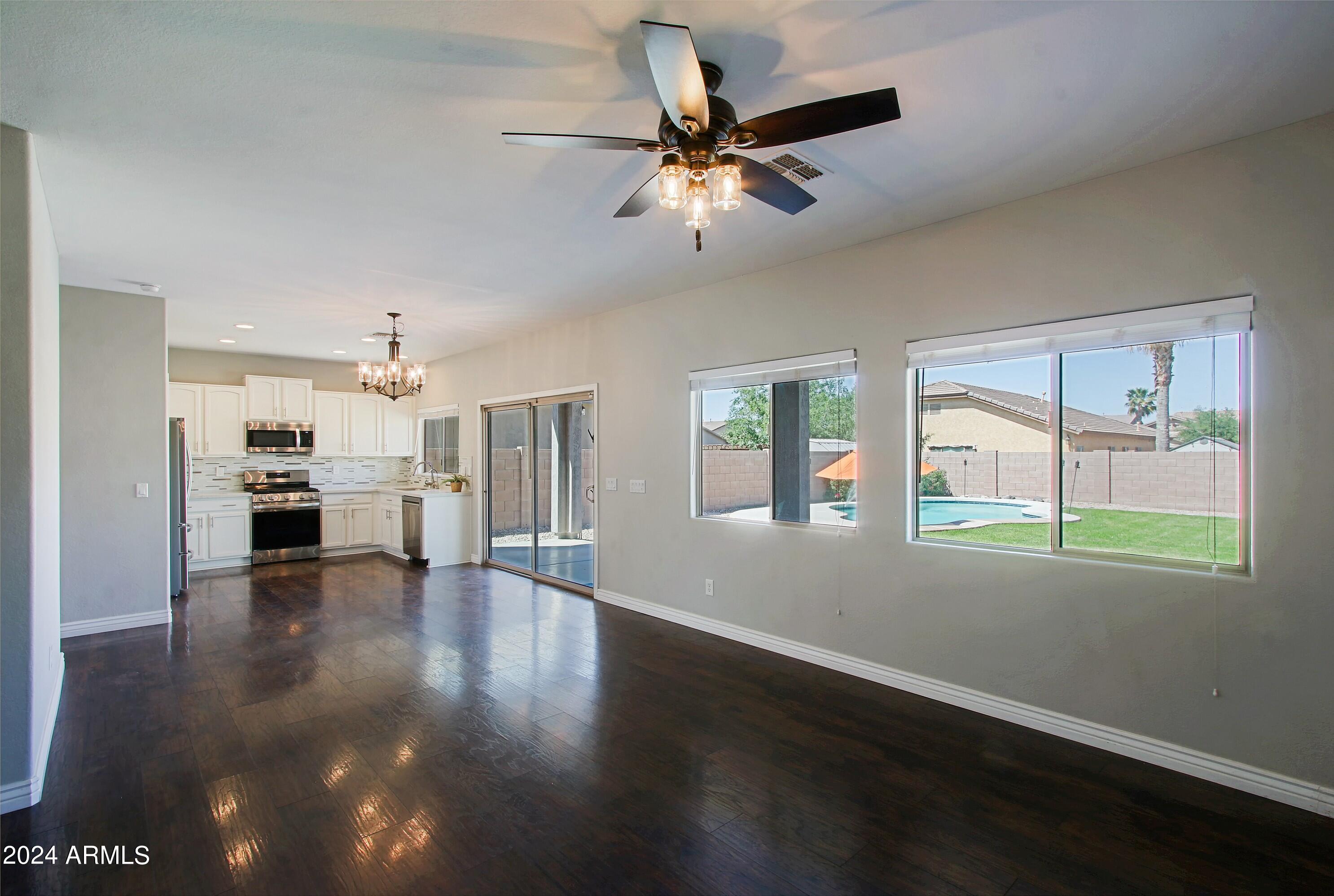 44208 Rhinestone Road Maricopa, AZ 85139 - Photo 18 of 63 Family Room and Kitchen