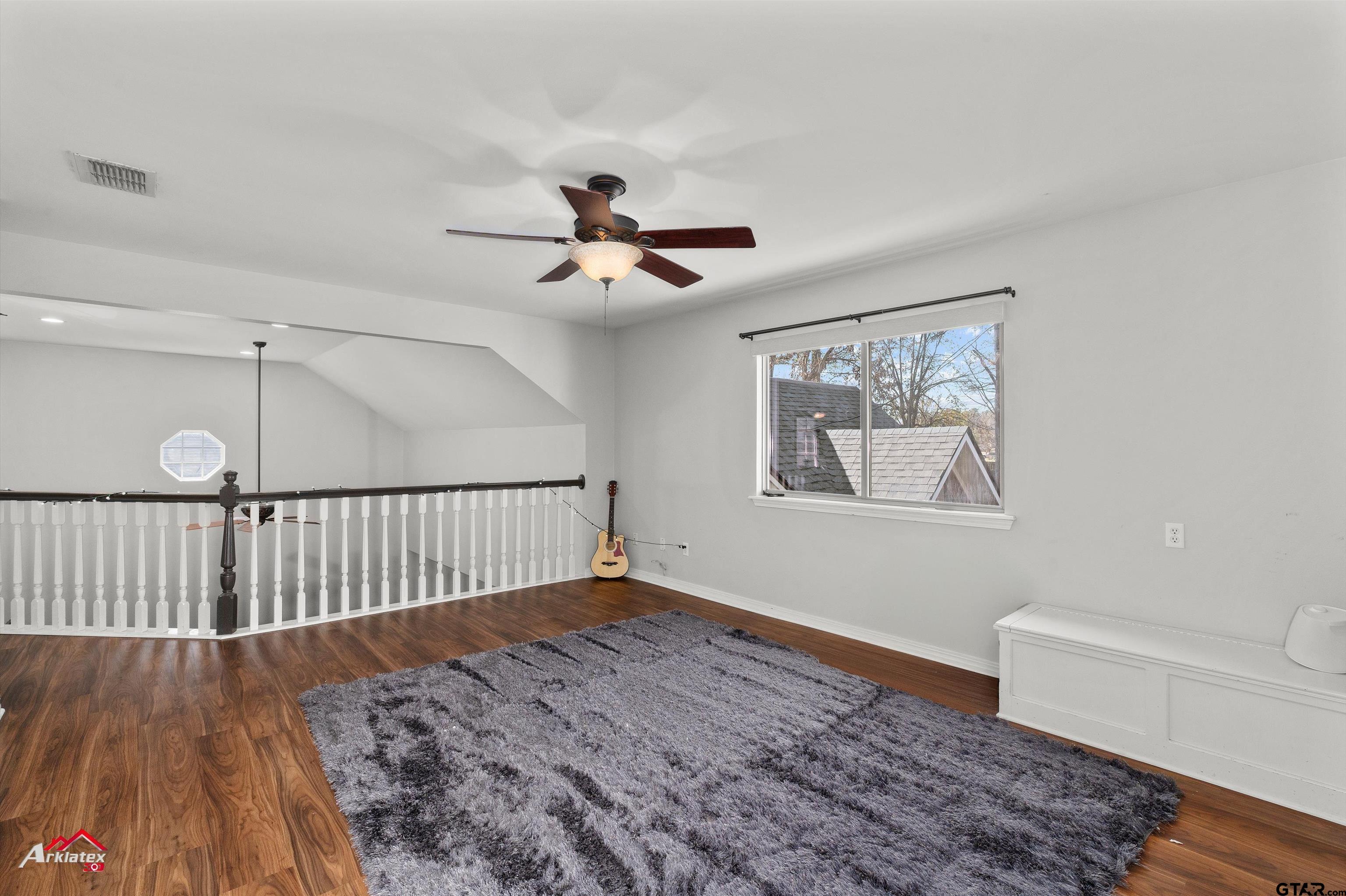 3815 Holly Ridge Drive Longview, TX 75605 - Photo 15 of 22 a view of a hallway with a large window