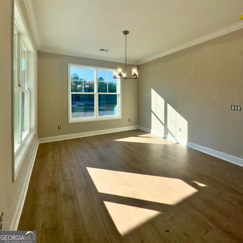 a bathroom with a sink vanity and a mirror