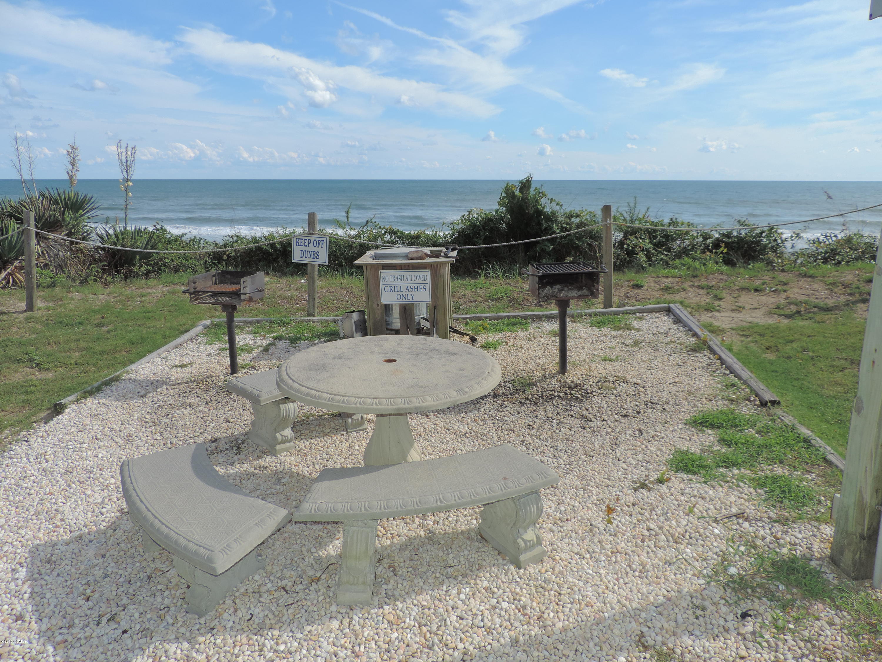1505 Salter Path Road, Unit 132 Indian Beach, NC 28512 - Photo 28 of 41 OF Grilling Steps Away
