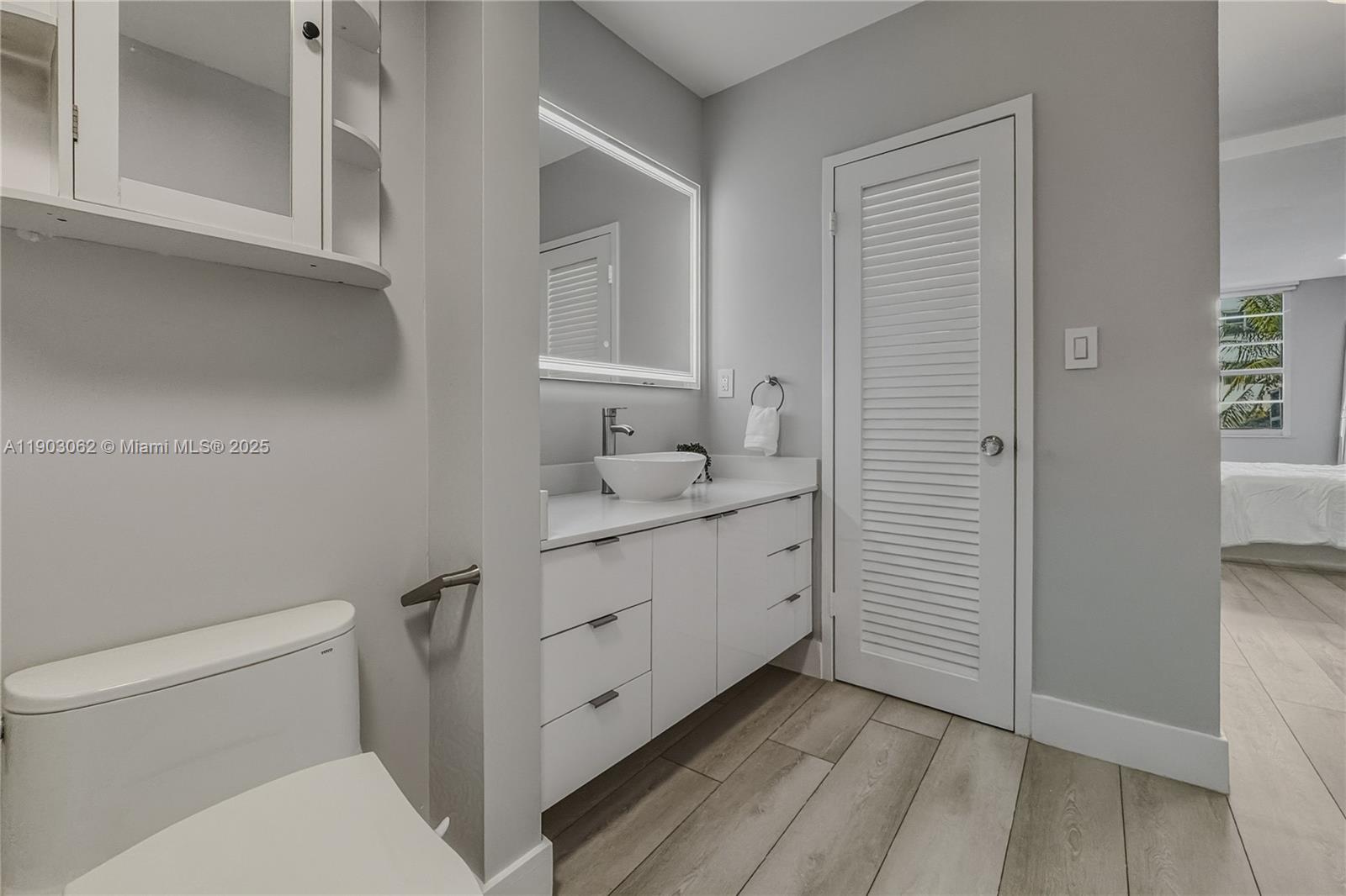 100 Lincoln Road, Unit 323 Miami Beach, FL 33139 - Photo 28 of 59 a bathroom with a sink toilet and shower