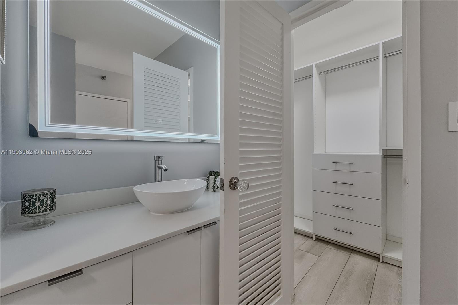 100 Lincoln Road, Unit 323 Miami Beach, FL 33139 - Photo 29 of 59 a bathroom with a toilet and a sink