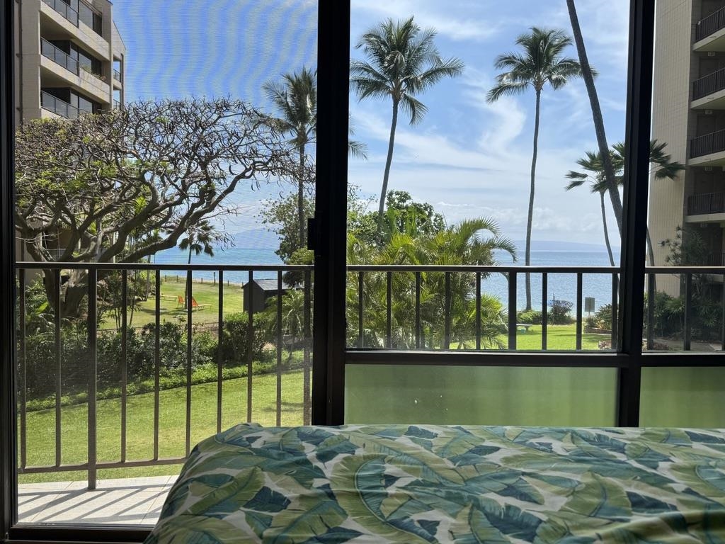 4327 Lower Honoapiilani Road, Unit 201B Lahaina, HI 96761 - Photo 17 of 26 a view of swimming pool from a balcony