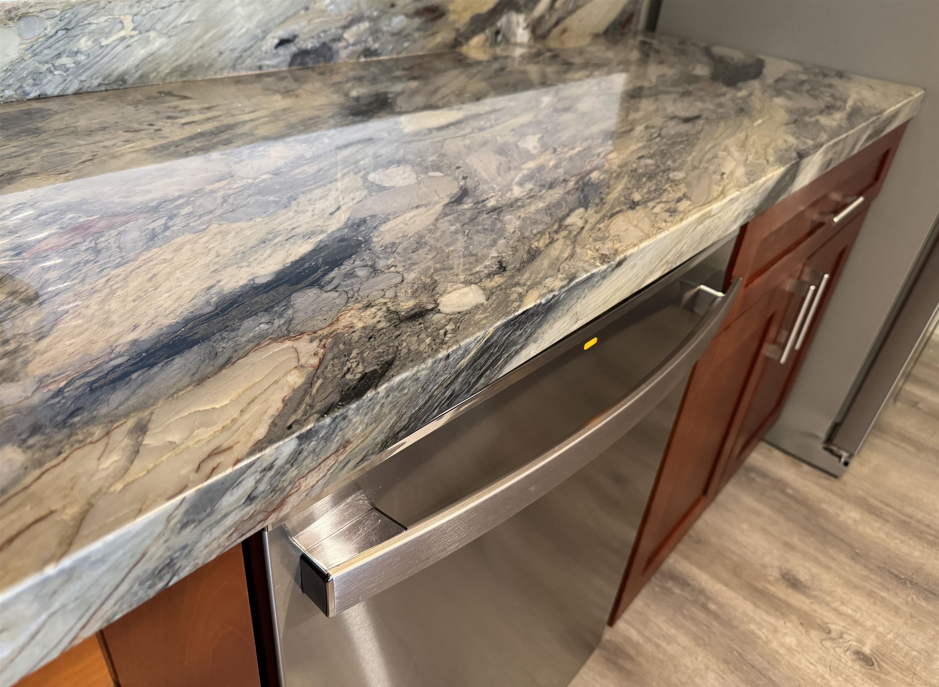 4327 Lower Honoapiilani Road, Unit 201B Lahaina, HI 96761 - Photo 3 of 26 a close view of sink and microwave