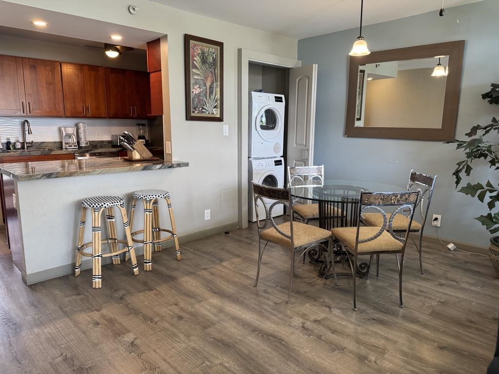 4327 Lower Honoapiilani Road, Unit 201B Lahaina, HI 96761 - Photo 7 of 26 a view of a dining room with furniture