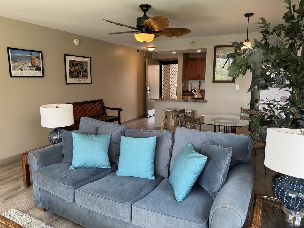 4327 Lower Honoapiilani Road, Unit 201B Lahaina, HI 96761 - Photo 10 of 26 a living room with furniture and a potted plant