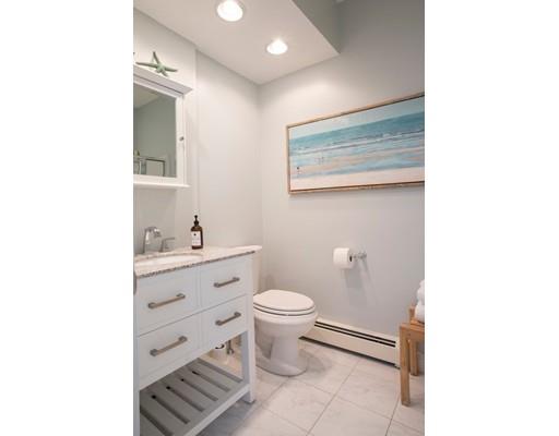 11 Pickwick Road Marblehead, MA 01945 - Photo 11 of 24 a bathroom with a toilet sink and a mirror