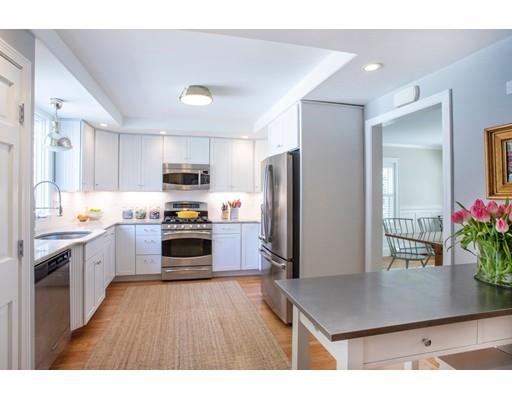 11 Pickwick Road Marblehead, MA 01945 - Photo 2 of 24 a kitchen with refrigerator cabinets and wooden floor
