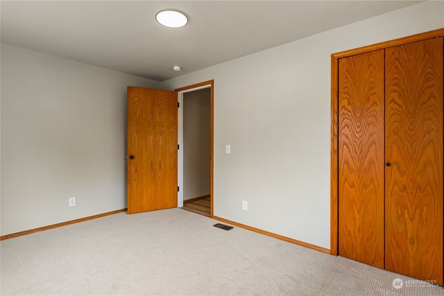 an empty room with sliding door