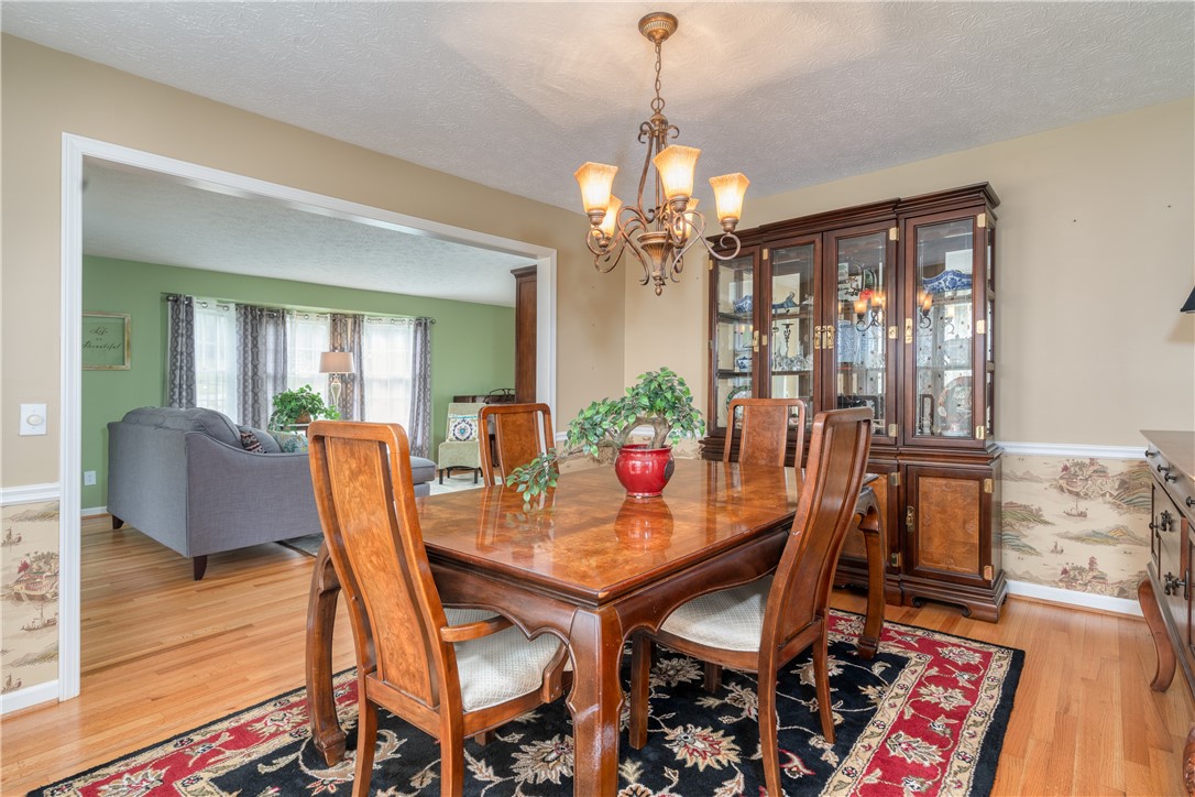 7 Bardney Circle Perinton, NY 14450 - Photo 15 of 38 Super wide opening to the living room area.