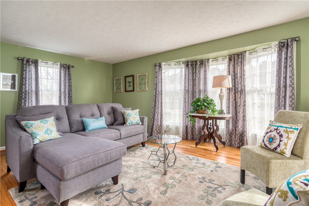 7 Bardney Circle Perinton, NY 14450 - Photo 16 of 38 More gorgeous hardwood flooring in the living room