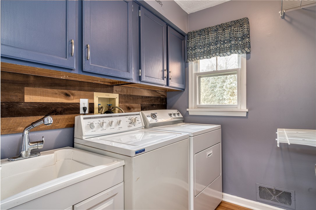 7 Bardney Circle Perinton, NY 14450 - Photo 20 of 38 Updated Laundry room with new utility tub. Washer