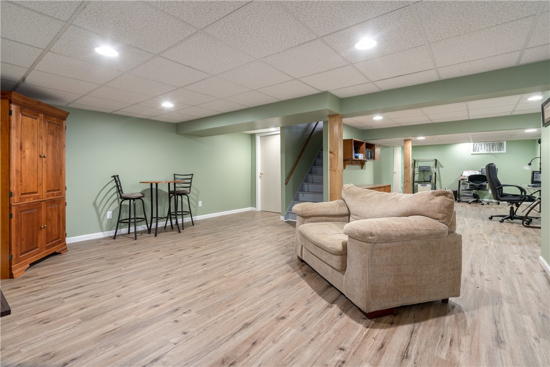 7 Bardney Circle Perinton, NY 14450 - Photo 33 of 38 Finished basement has new vinyl plank flooring, a