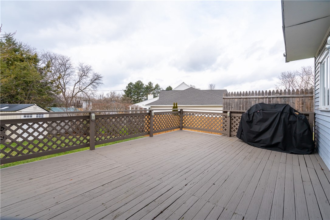 7 Bardney Circle Perinton, NY 14450 - Photo 35 of 38 Wood deck off of kitchen is spacious and perfect f