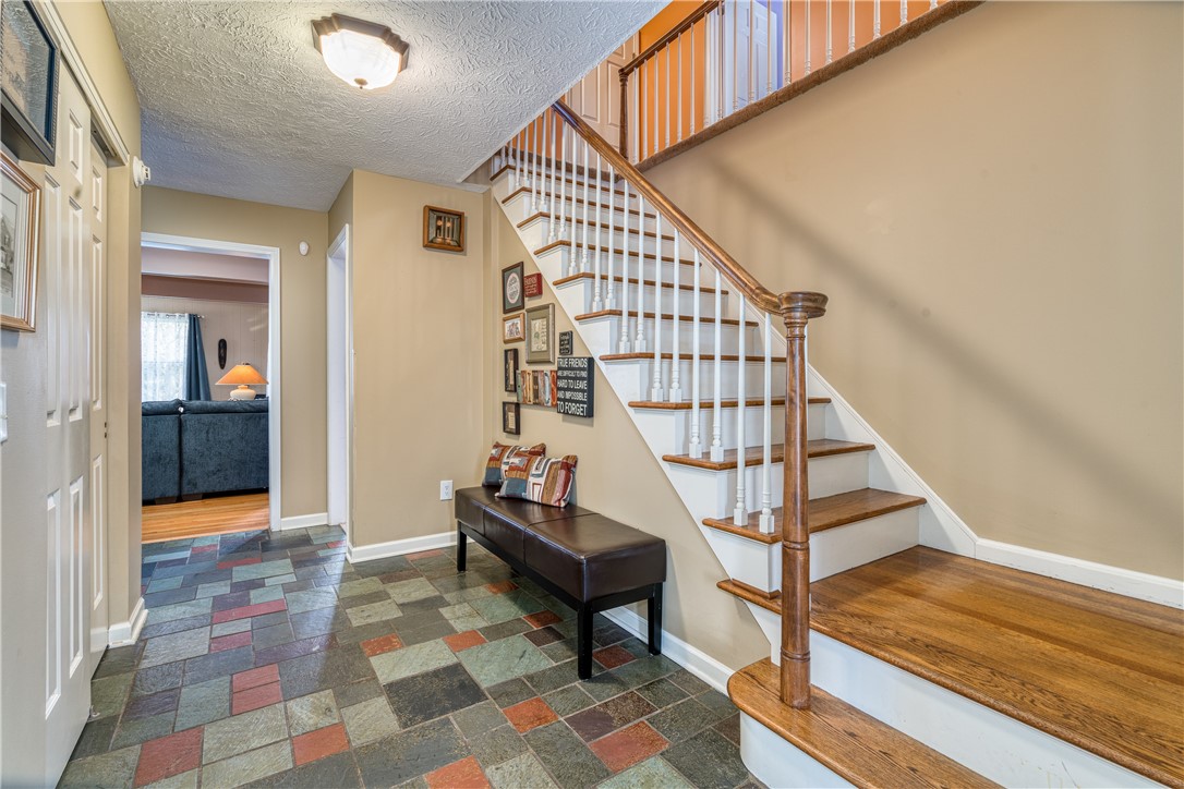7 Bardney Circle Perinton, NY 14450 - Photo 5 of 38 The foyer features a large coat closet and hardwoo