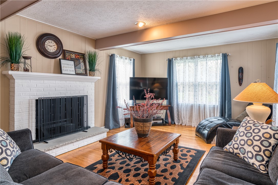7 Bardney Circle Perinton, NY 14450 - Photo 6 of 38 Great gathering room open to the kitchen. Woodburn