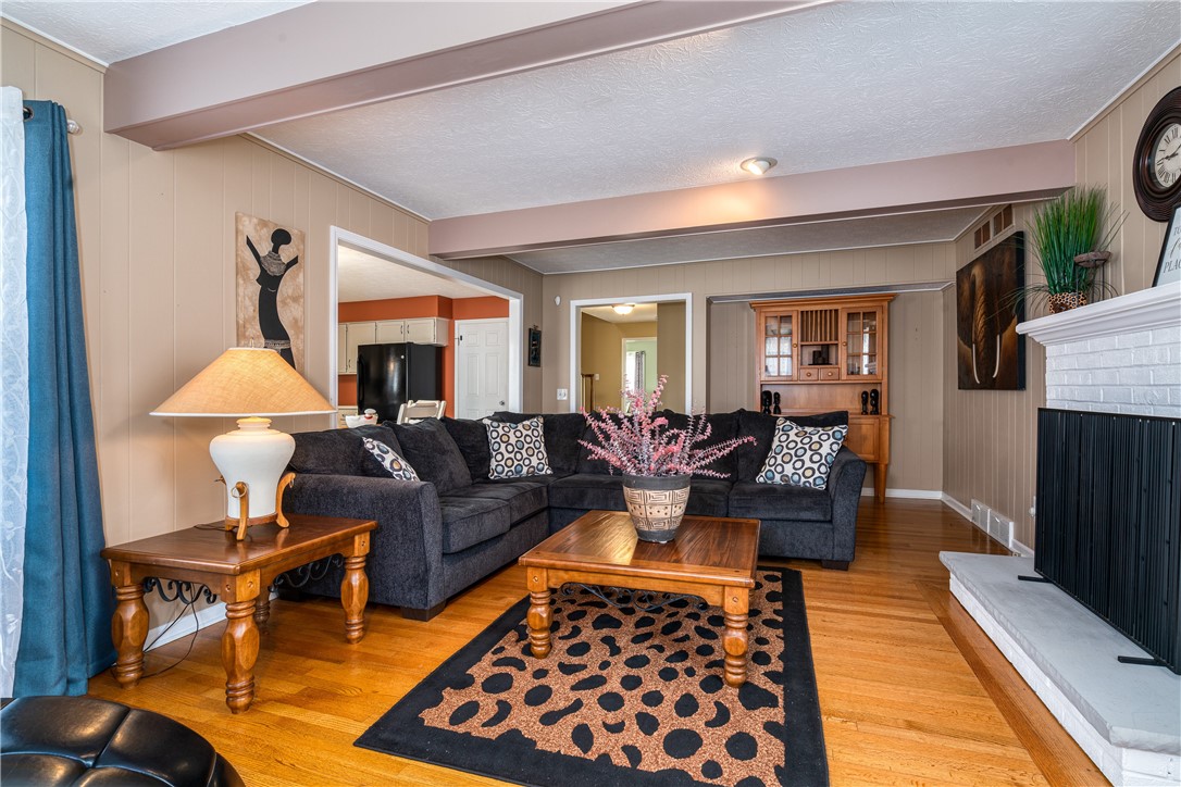 7 Bardney Circle Perinton, NY 14450 - Photo 7 of 38 Hardwood floors gleam! WB Fireplace was serviced l