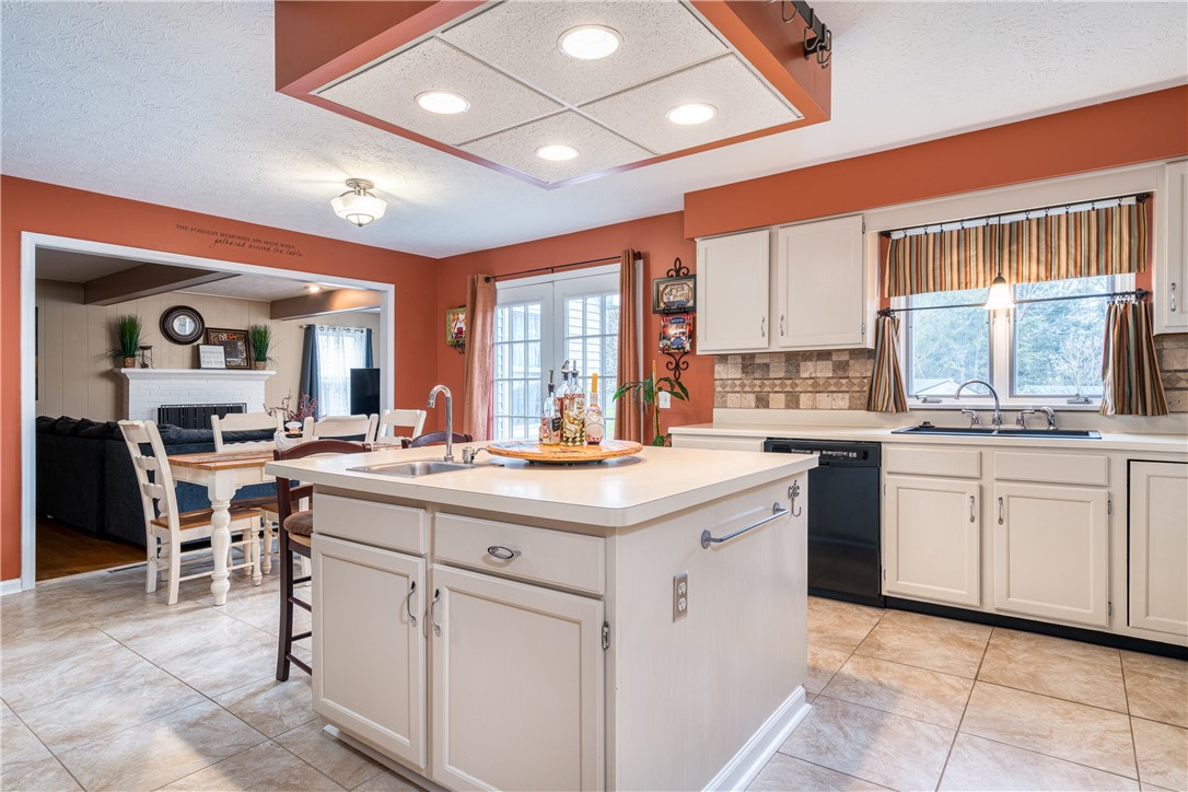 7 Bardney Circle Perinton, NY 14450 - Photo 10 of 38 Beautiful new tile flooring! Open to the family r