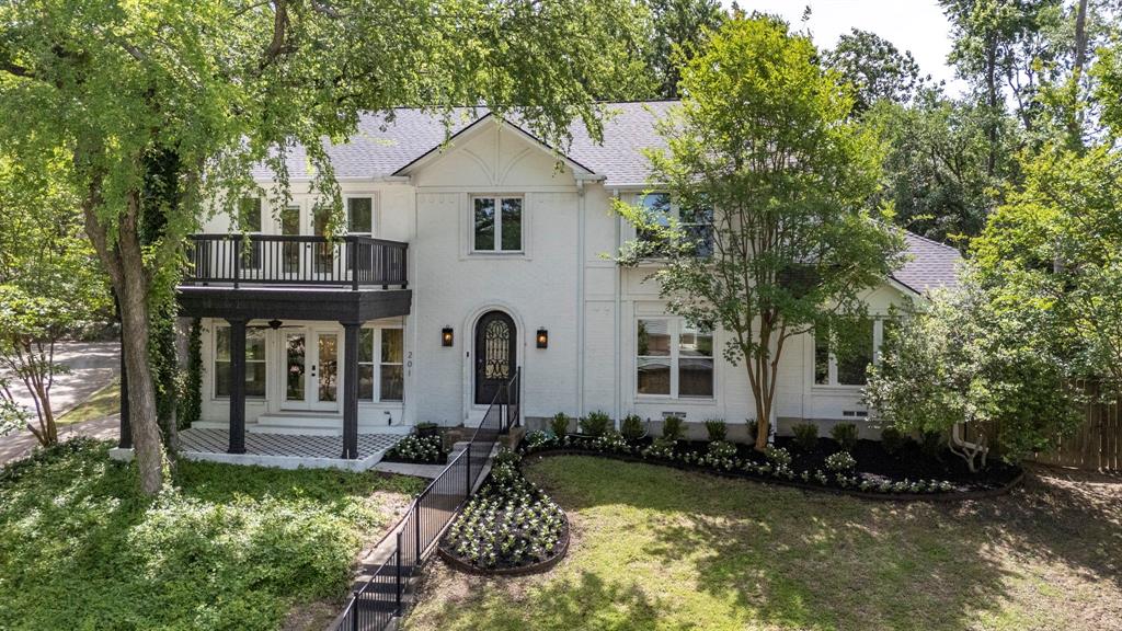 201 Forest Trace Rockwall, TX 75087 - Photo 1 of 1 a front view of a house with garden
