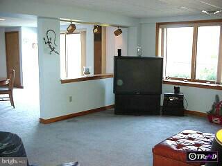 2 Raphael Road Hockessin, DE 19707 - Photo 2 of 6 a view of a livingroom with furniture and a window