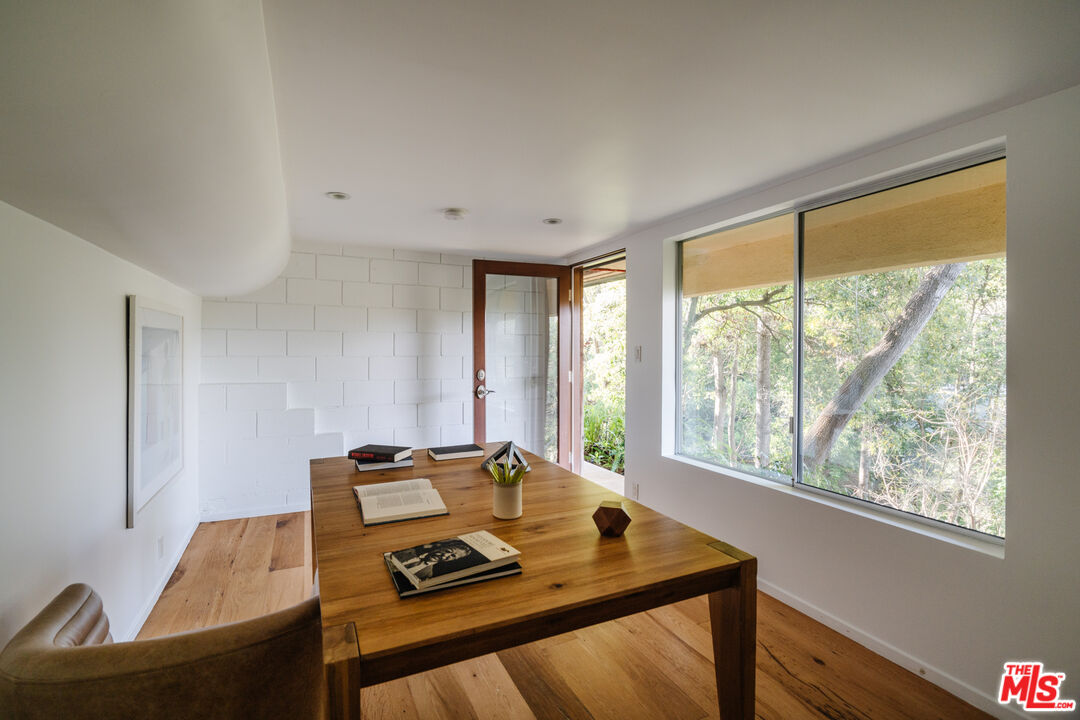 2355 Hermits Glen Los Angeles, CA 90046 - Photo 32 of 45 a living room with a window